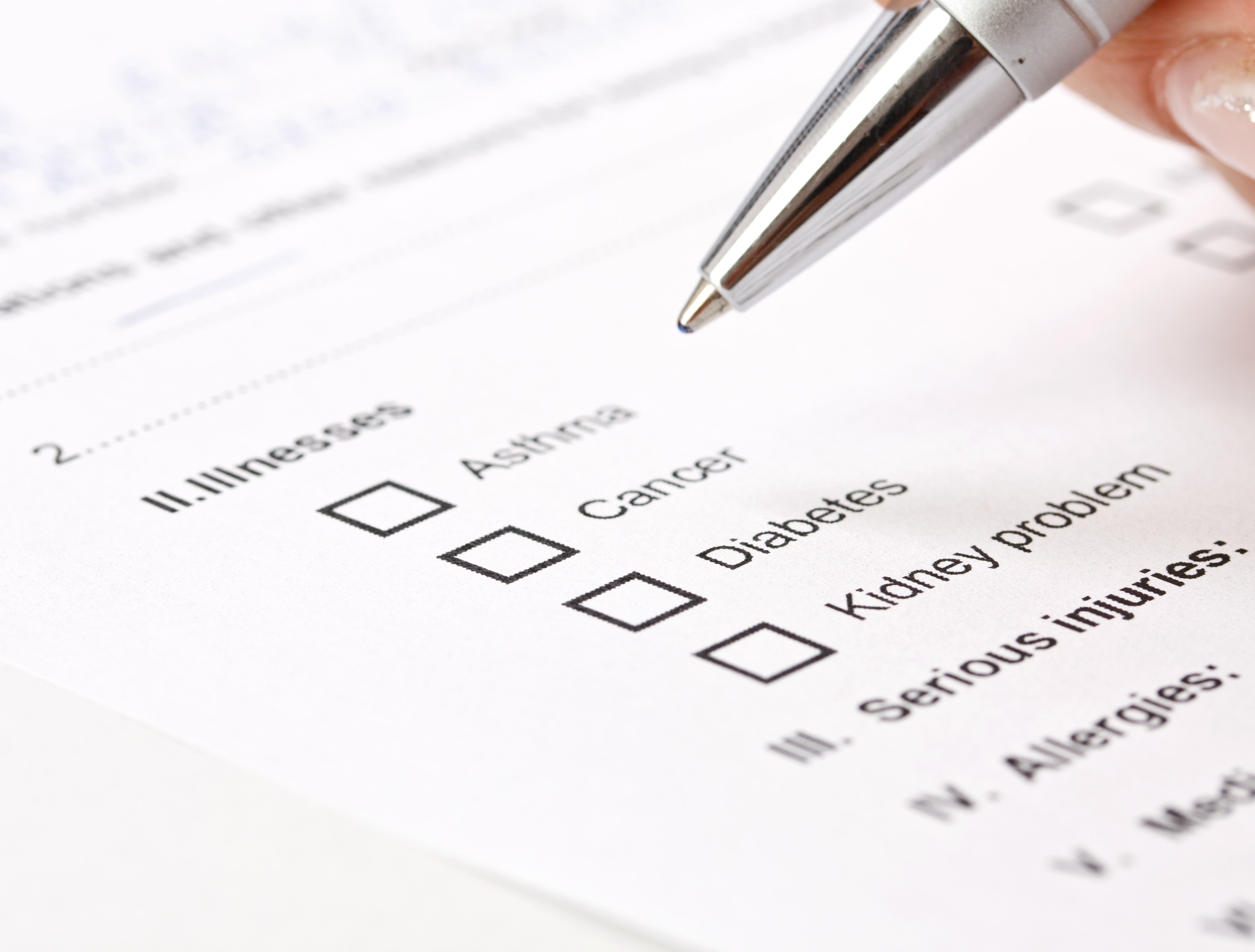 Close up photo of a medical history questionnaire