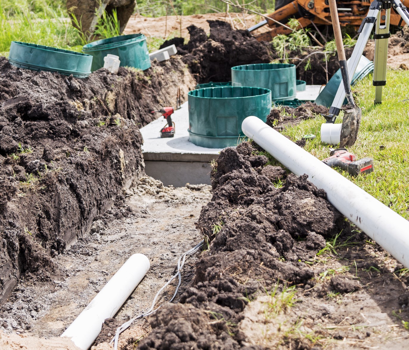 Scene of a construction site installing a new mound septic system.